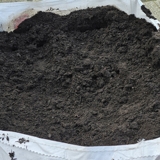 Compost van natuly in big bag of losgestort